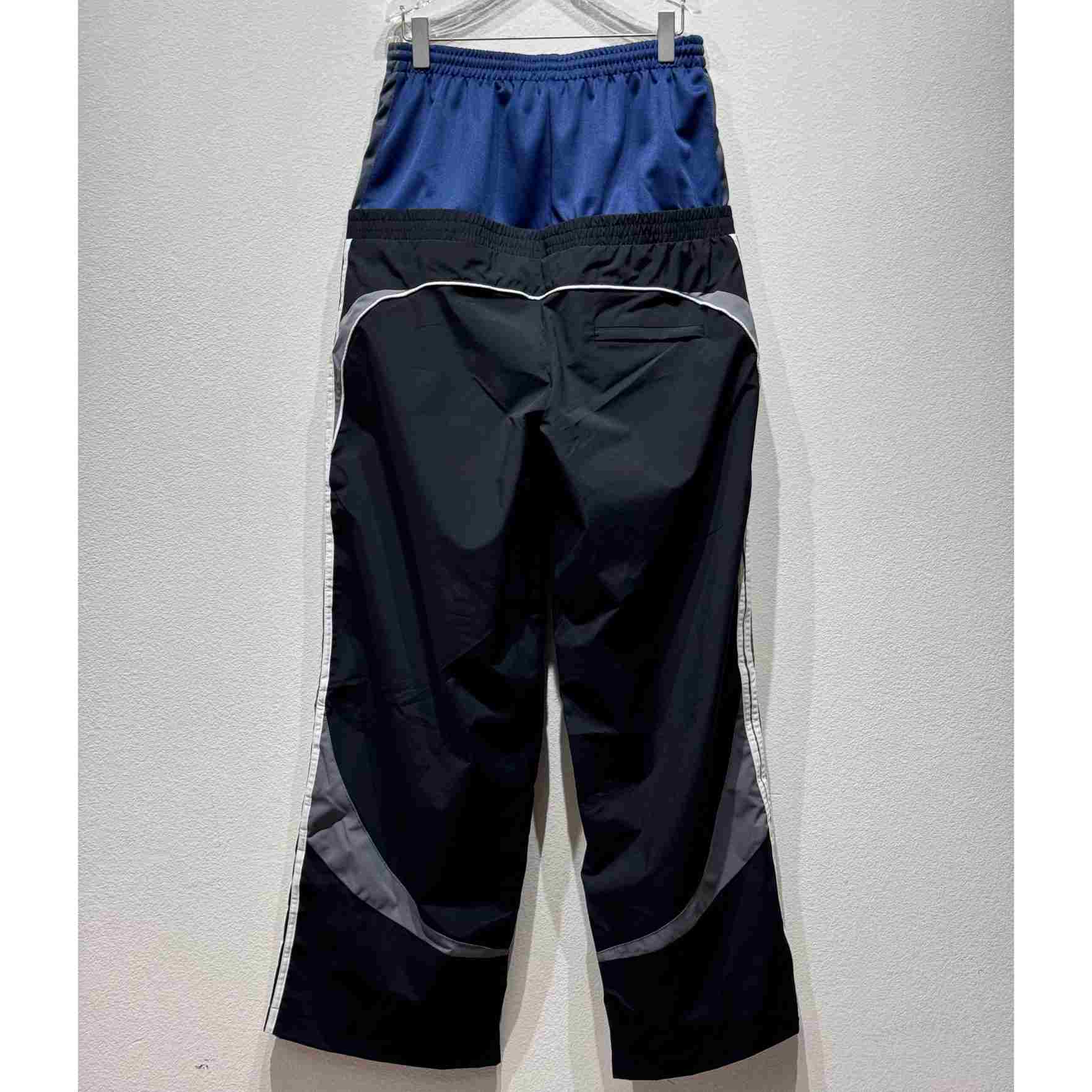 Balenciaga Cut-Up Tracksuit Pants In Black - FashionPlug