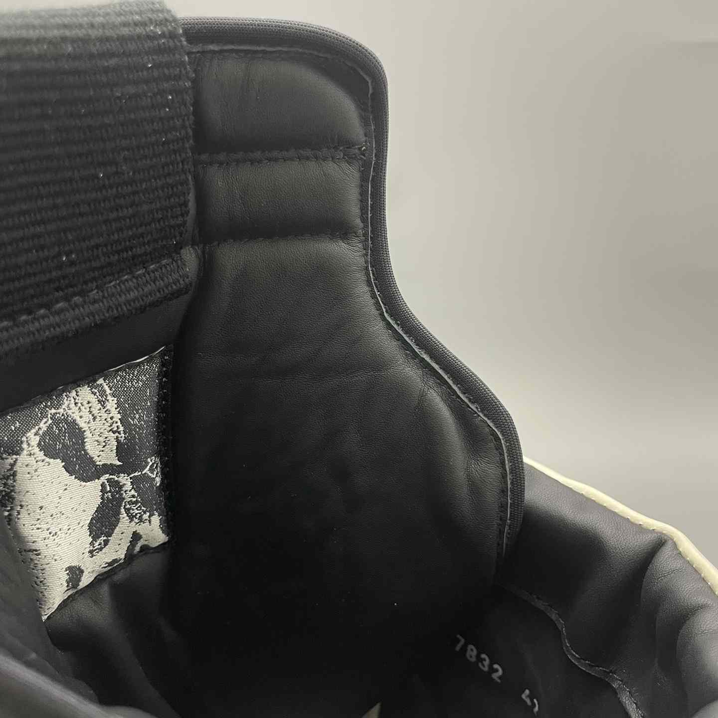 Rick Owens High-Top Sneakers - FashionPlug