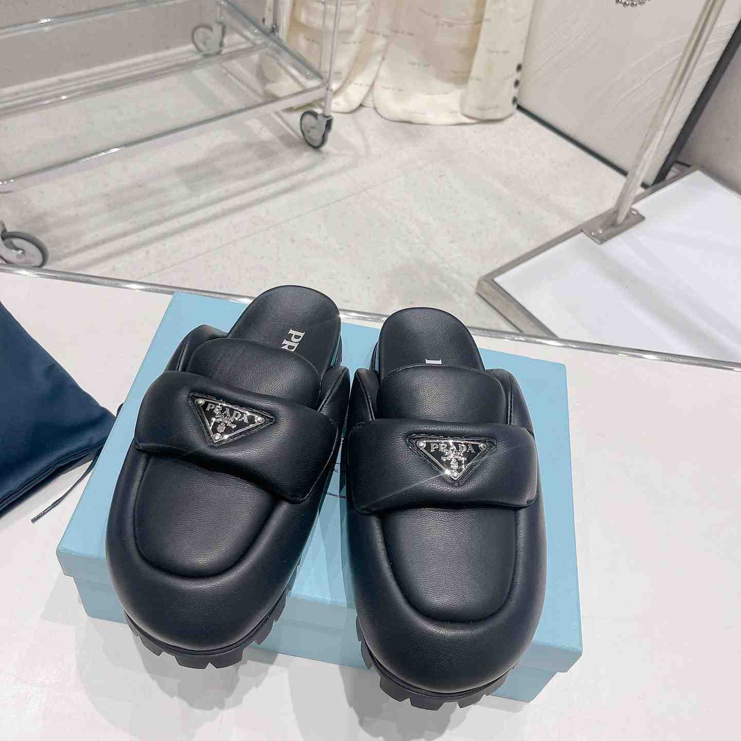 Prada Soft Padded Nappa Leather Sabots - FashionPlug