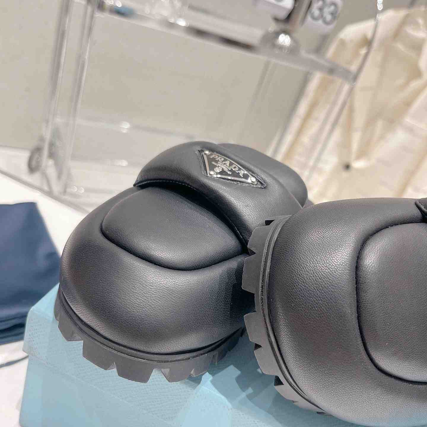 Prada Soft Padded Nappa Leather Sabots - FashionPlug