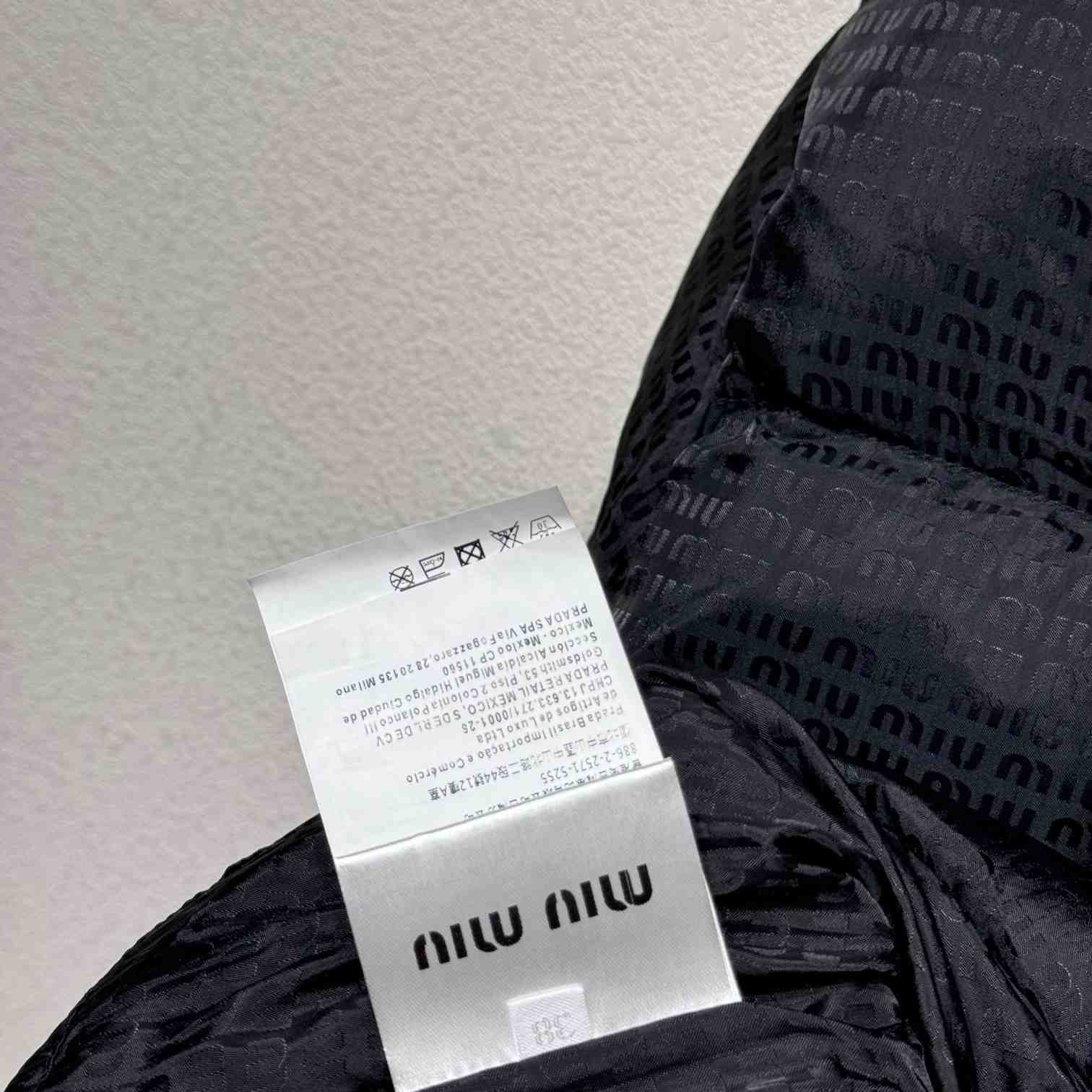 Miu Miu logo-appliqué puffer jacket  - FashionPlug