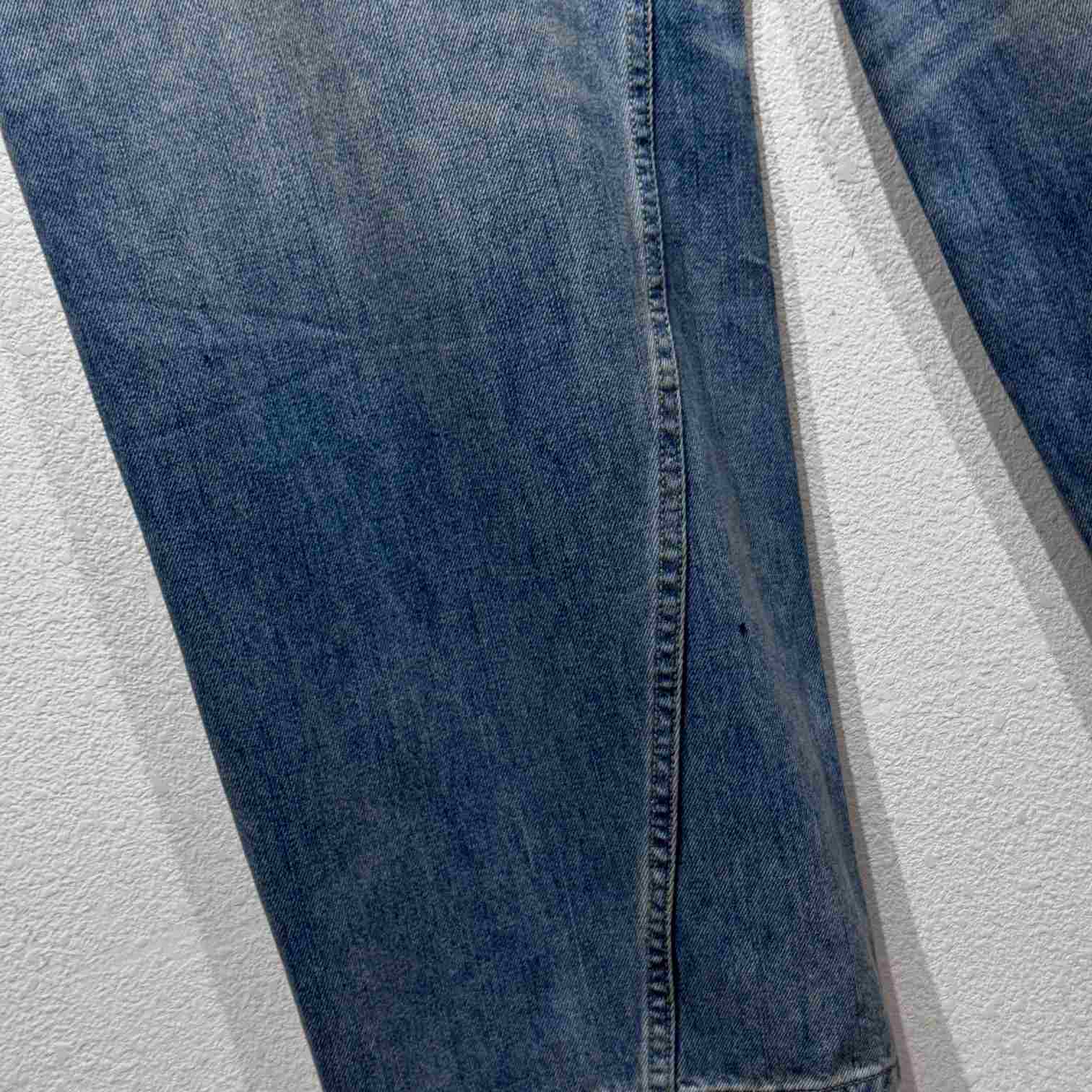 Balenciaga Twisted Wide-leg Jeans  - FashionPlug