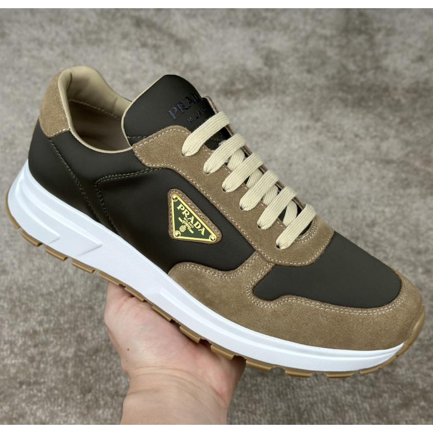 Prada Leather And Re-Nylon Sneakers - FashionPlug