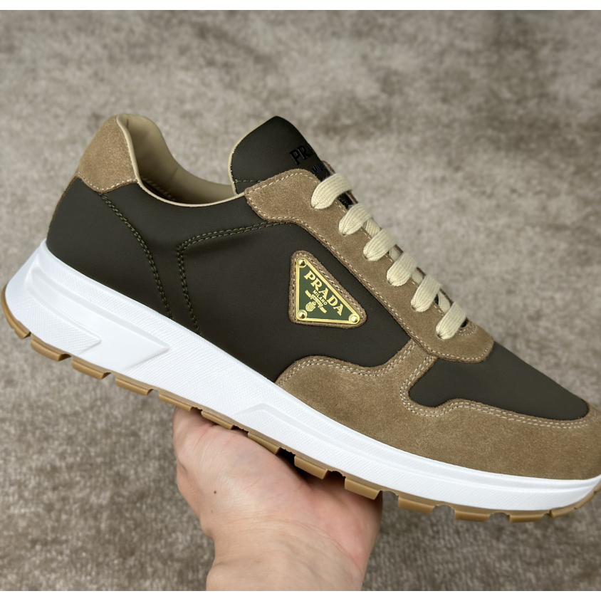 Prada Leather And Re-Nylon Sneakers - FashionPlug