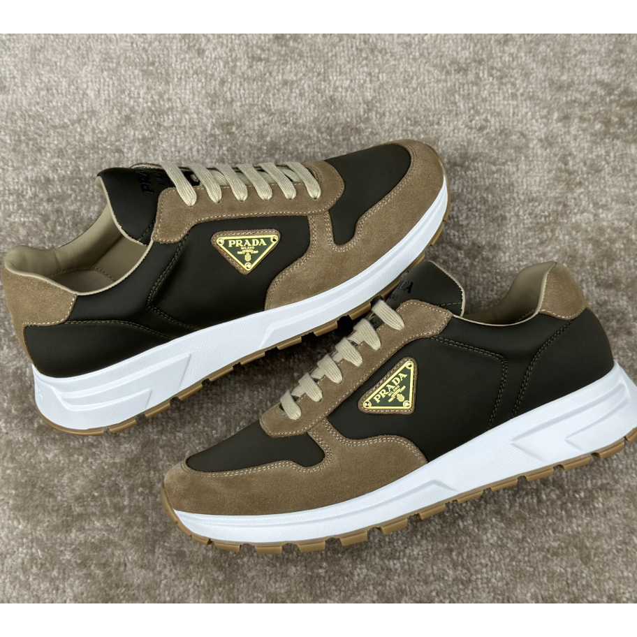 Prada Leather And Re-Nylon Sneakers - FashionPlug