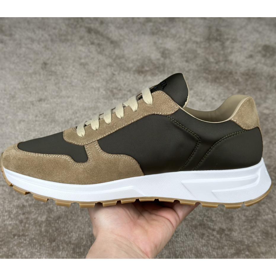 Prada Leather And Re-Nylon Sneakers - FashionPlug