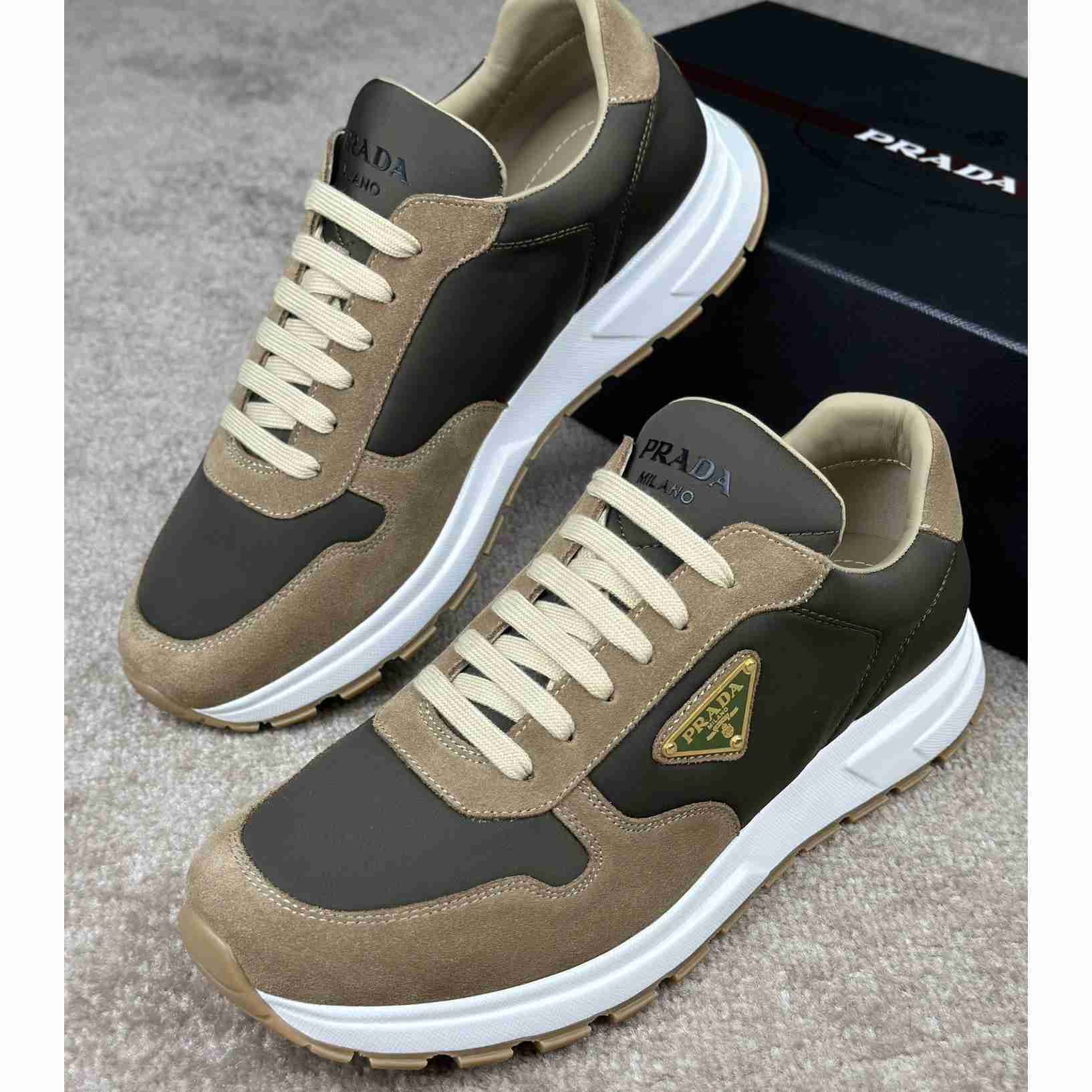 Prada Leather And Re-Nylon Sneakers - FashionPlug