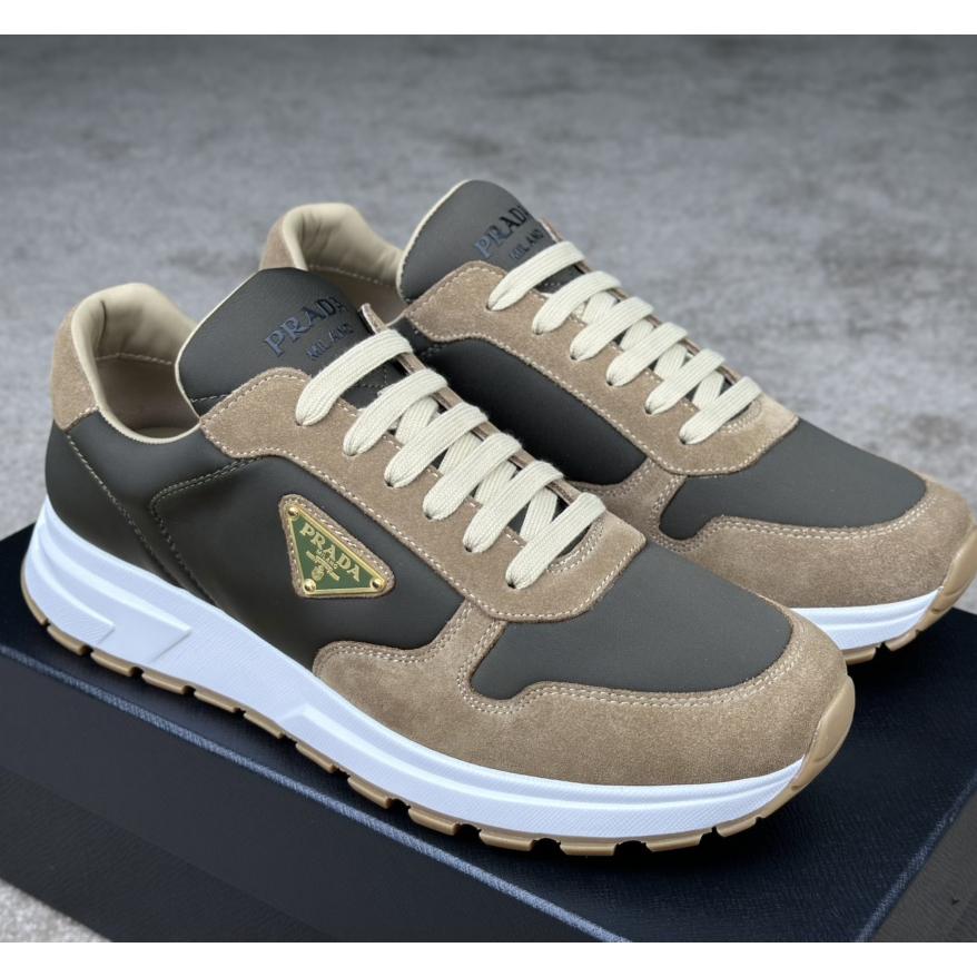 Prada Leather And Re-Nylon Sneakers - FashionPlug