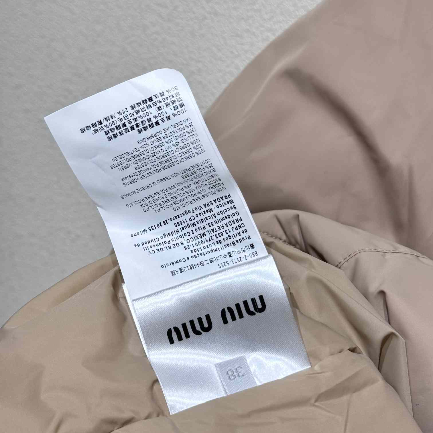 Miu Miu Drawstring Hooded Down Jacket - FashionPlug