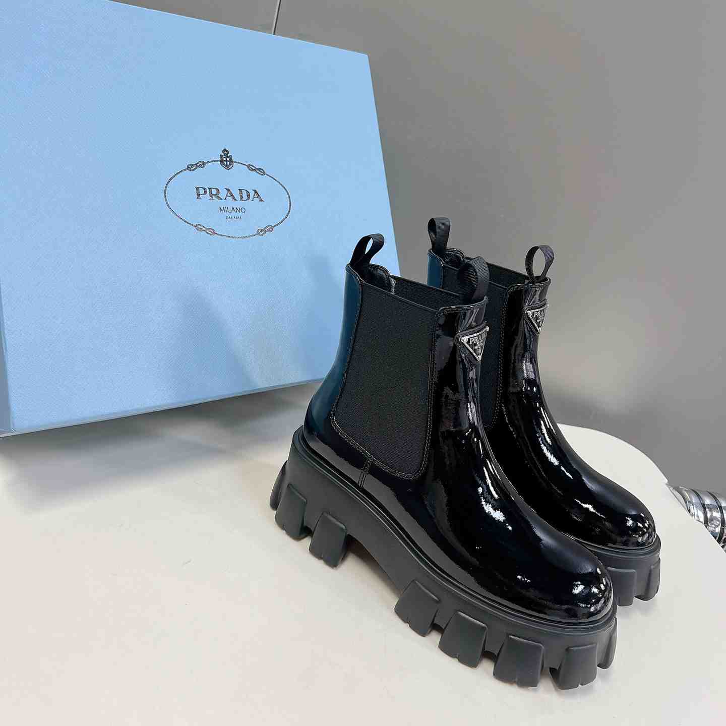 Prada Monolith Ankle Boots - FashionPlug