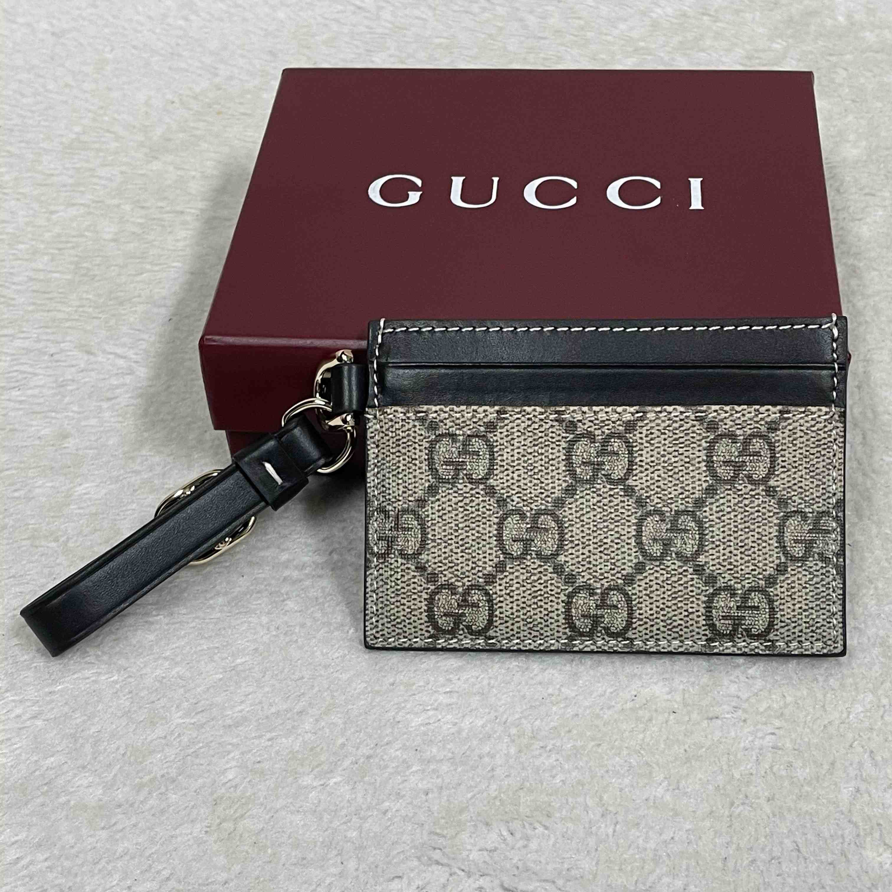 Gucci GG Emblem Card Case With Strap - FashionPlug