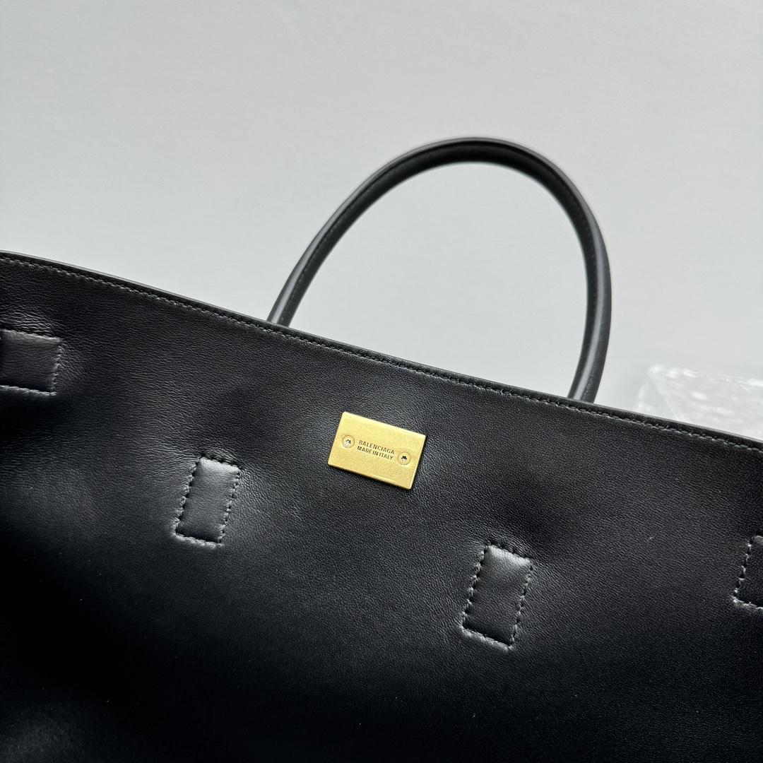 Balenciaga Bel Air Small Carry All Bag in black - FashionPlug
