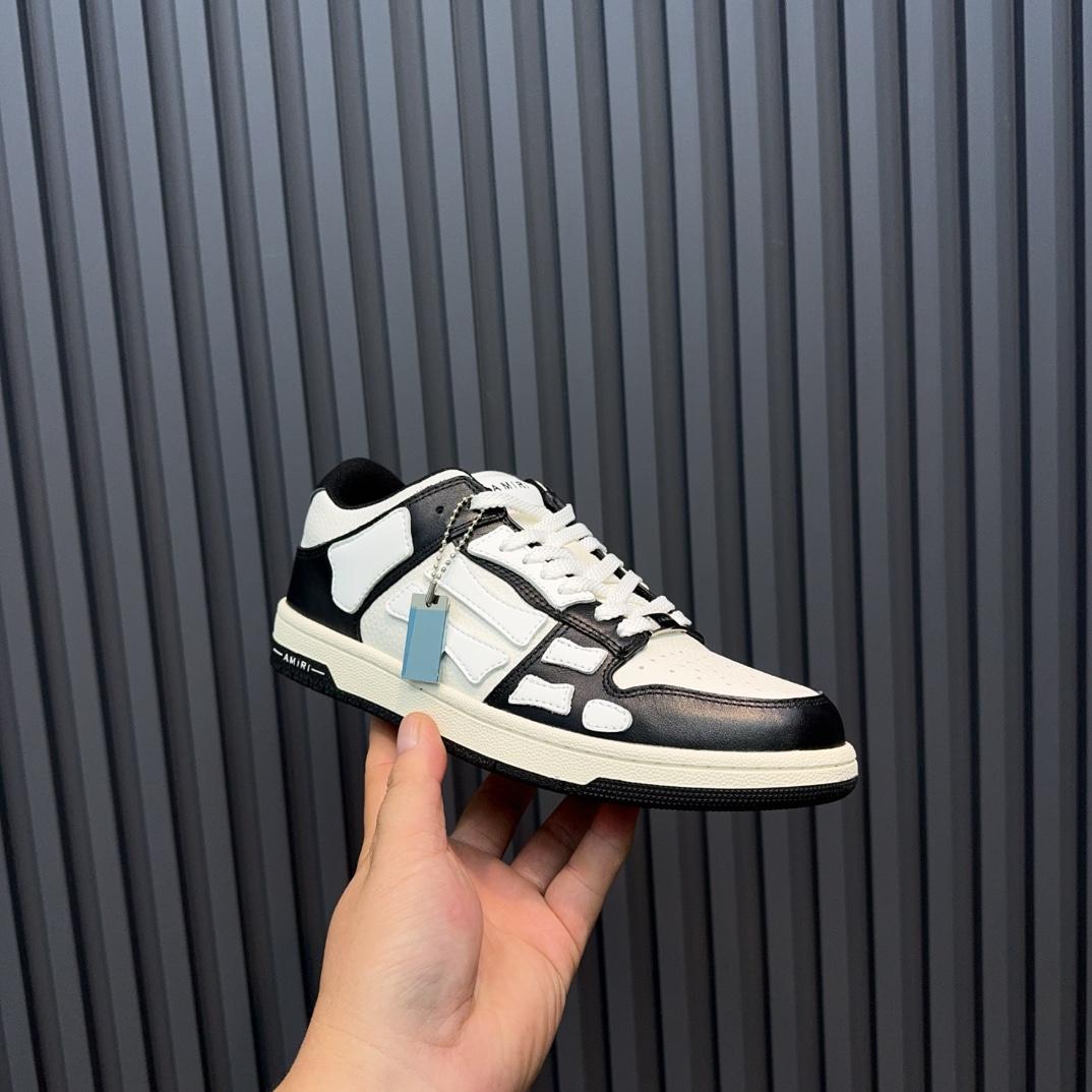 Amiri Low Top Sneaker - FashionPlug