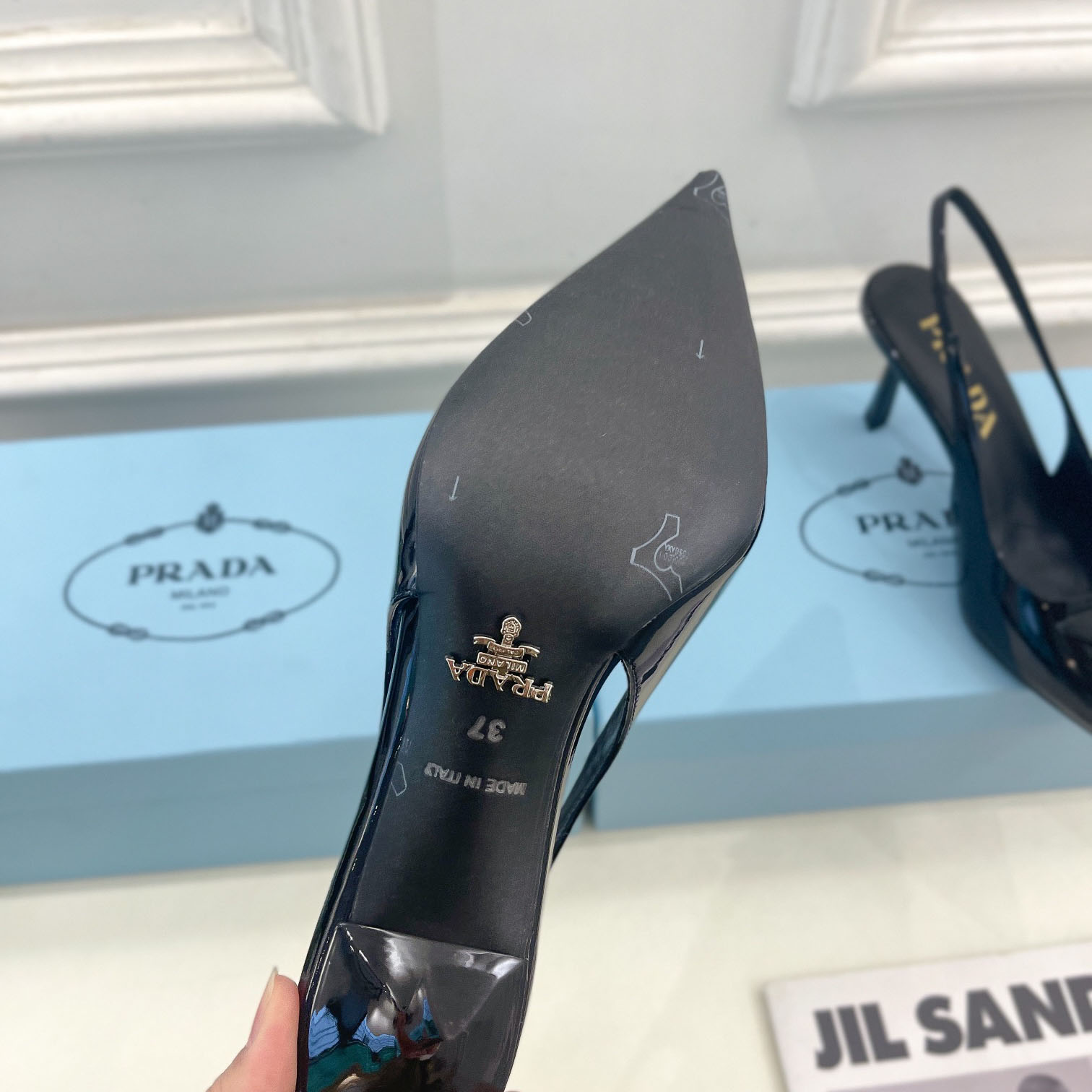 Prada 75m Patent Leather Slingback Pumps - FashionPlug