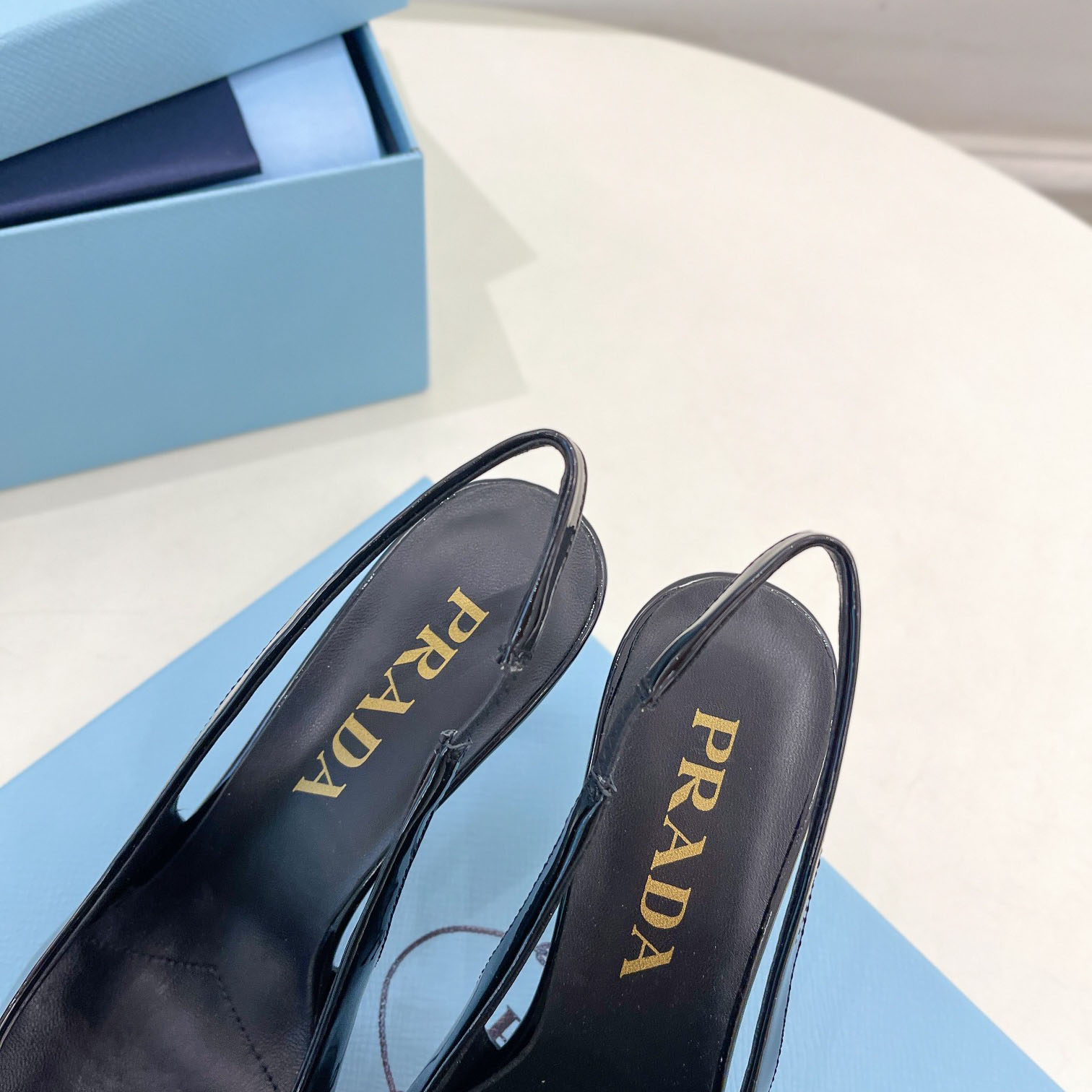 Prada 75m Patent Leather Slingback Pumps - FashionPlug