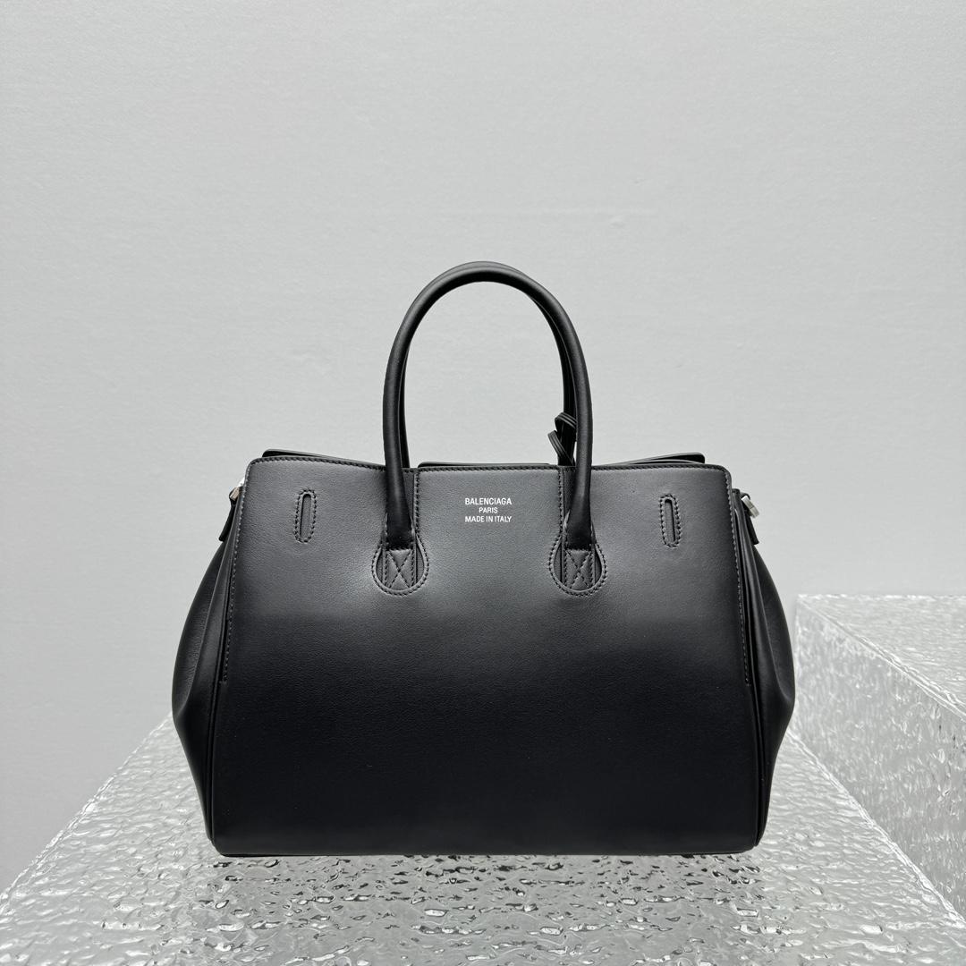 Balenciaga Bel Air Small Carry All Bag in black - FashionPlug
