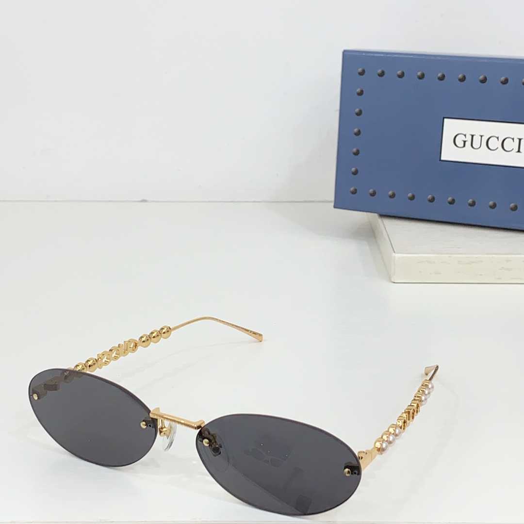 Gucci Oval Frame Sunglasses - FashionPlug