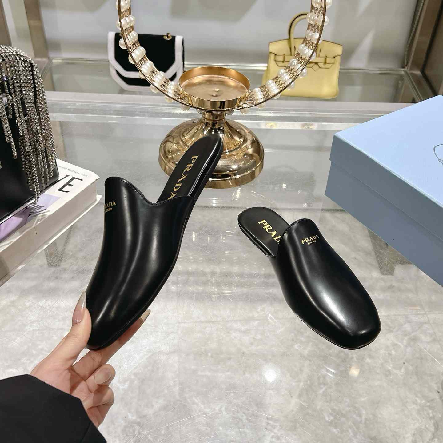 Prada Brushed Leather Slippers - FashionPlug