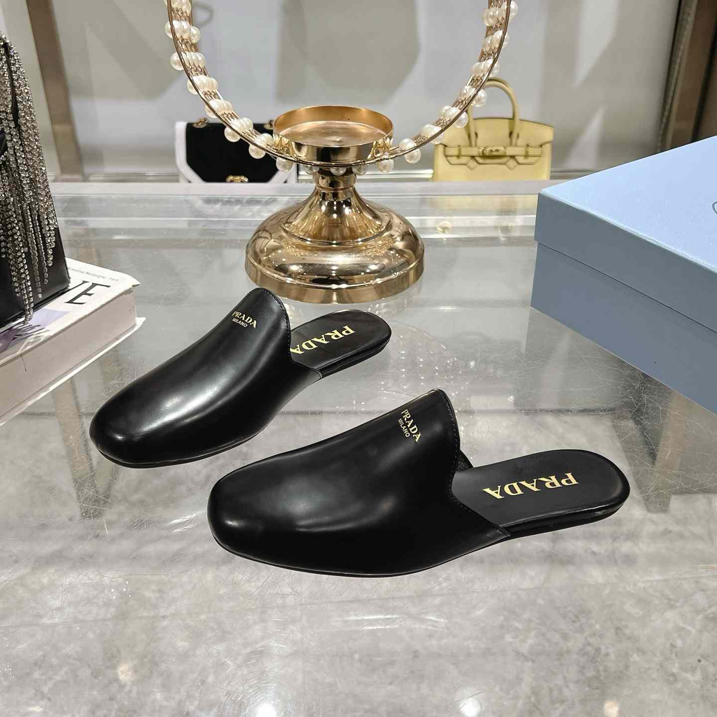 Prada Brushed Leather Slippers - FashionPlug