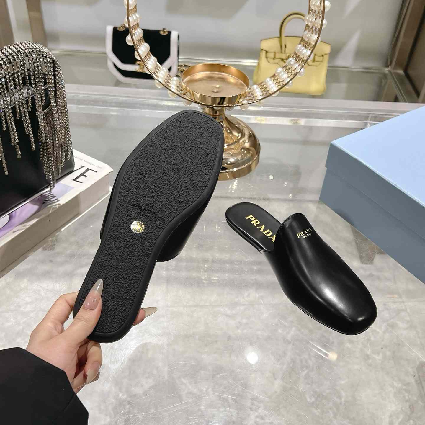Prada Brushed Leather Slippers - FashionPlug