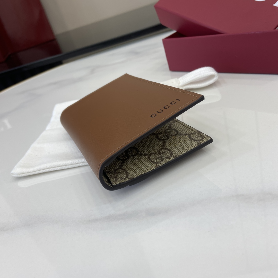 Gucci GG Emblem Bi-fold Embossed Card Case - FashionPlug