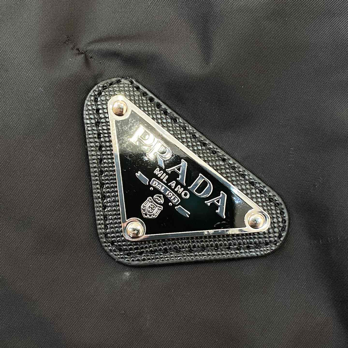Prada Re-Nylon Reversible Hooded Jacket - FashionPlug