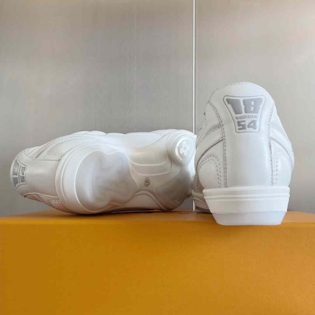 Louis Vuitton LV Footprint Soccer Sneaker   1AHDOA - FashionPlug