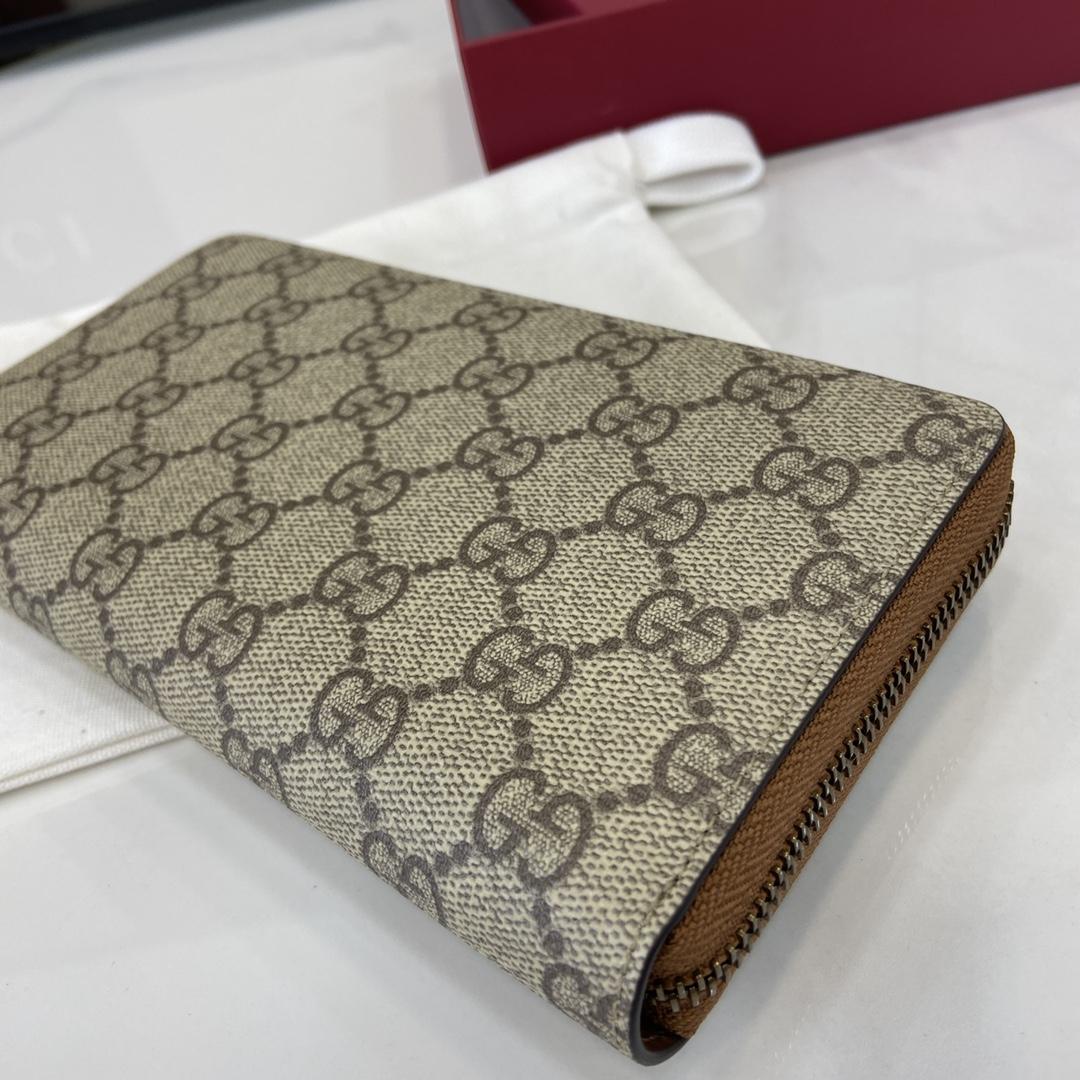 Gucci GG Emblem Around Wallet - FashionPlug