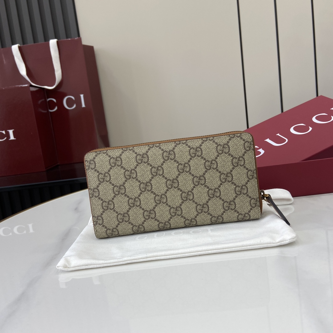 Gucci GG Emblem Around Wallet - FashionPlug