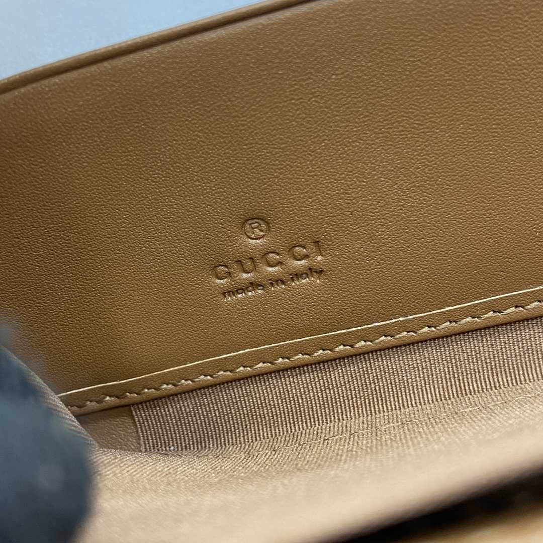Gucci GG Emblem Around Wallet - FashionPlug