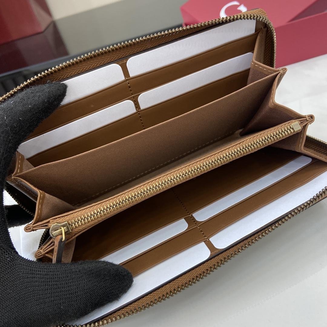 Gucci GG Emblem Around Wallet - FashionPlug