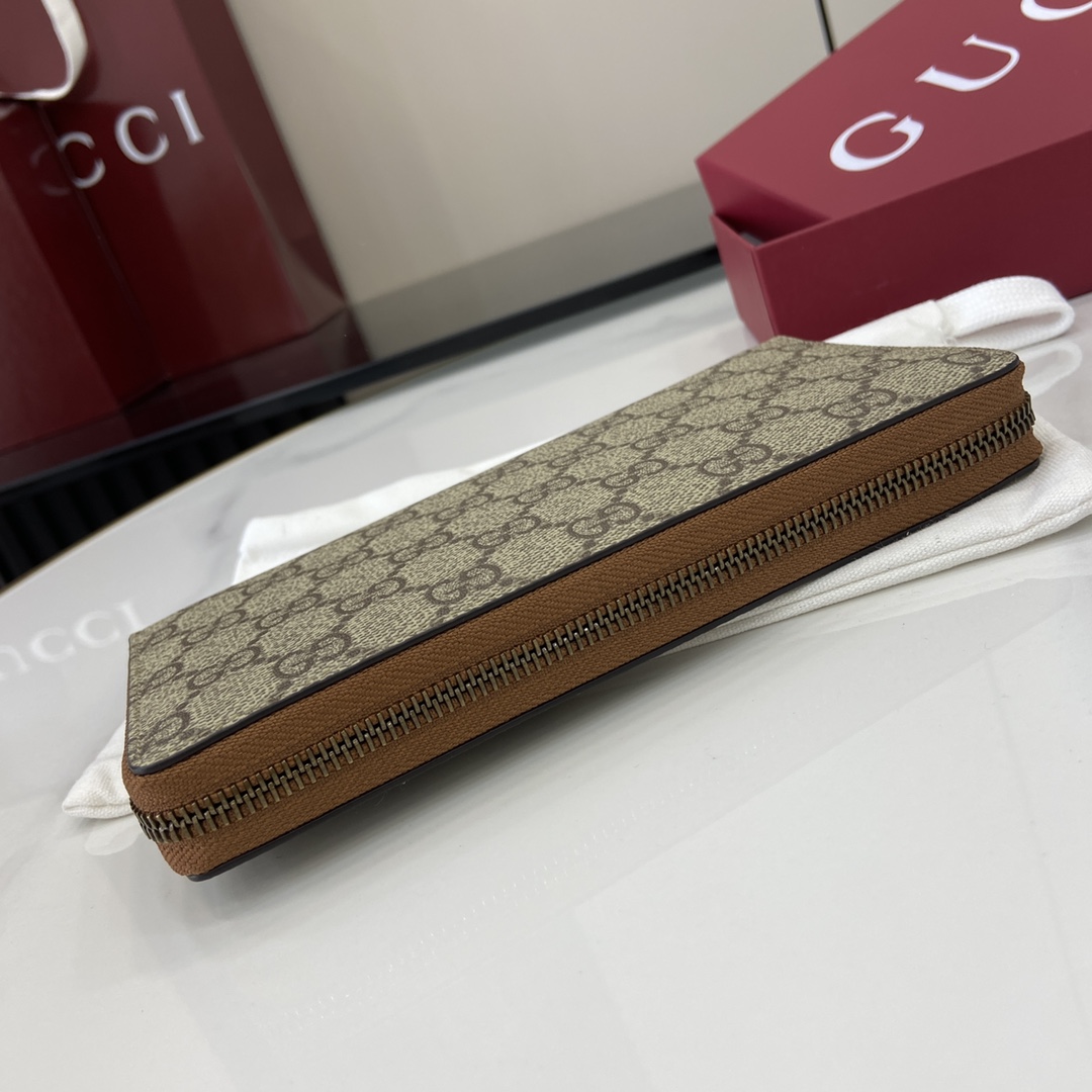 Gucci GG Emblem Around Wallet - FashionPlug