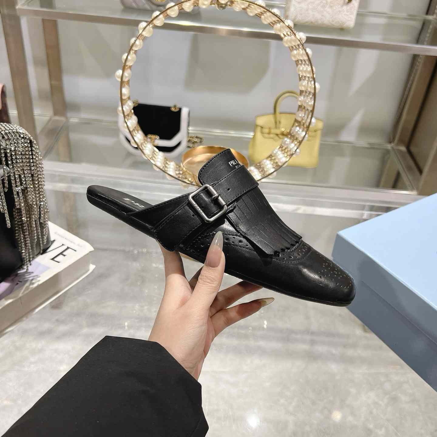 Prada Shuffle Fringed Monk Strap Leather Mules - FashionPlug