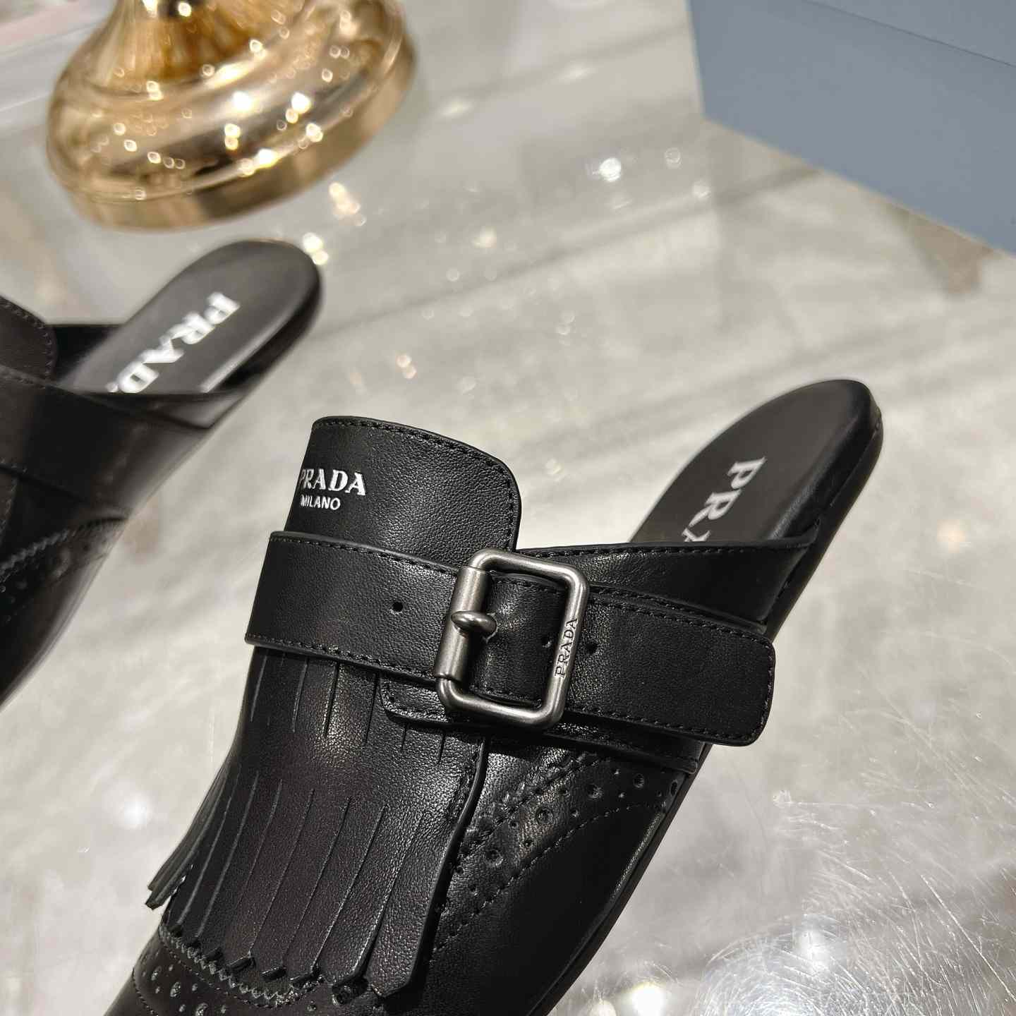 Prada Shuffle Fringed Monk Strap Leather Mules - FashionPlug