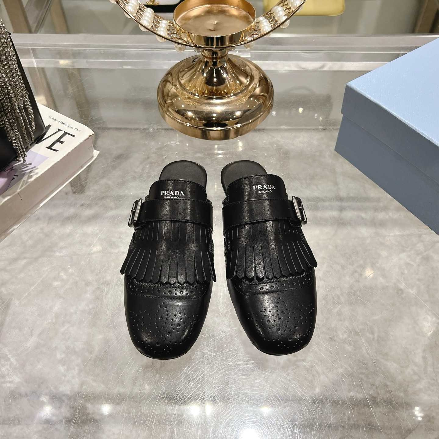 Prada Shuffle Fringed Monk Strap Leather Mules - FashionPlug