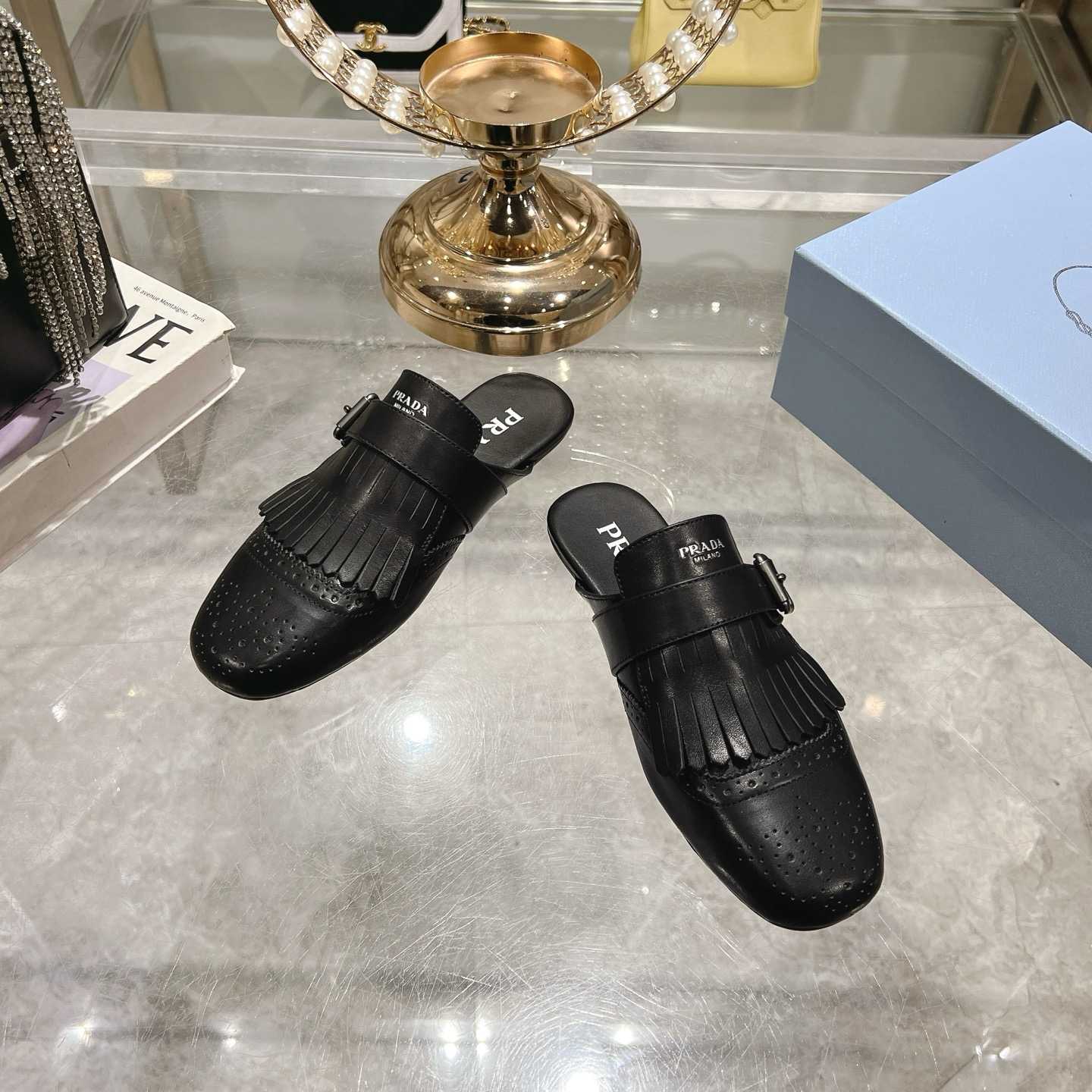 Prada Shuffle Fringed Monk Strap Leather Mules - FashionPlug