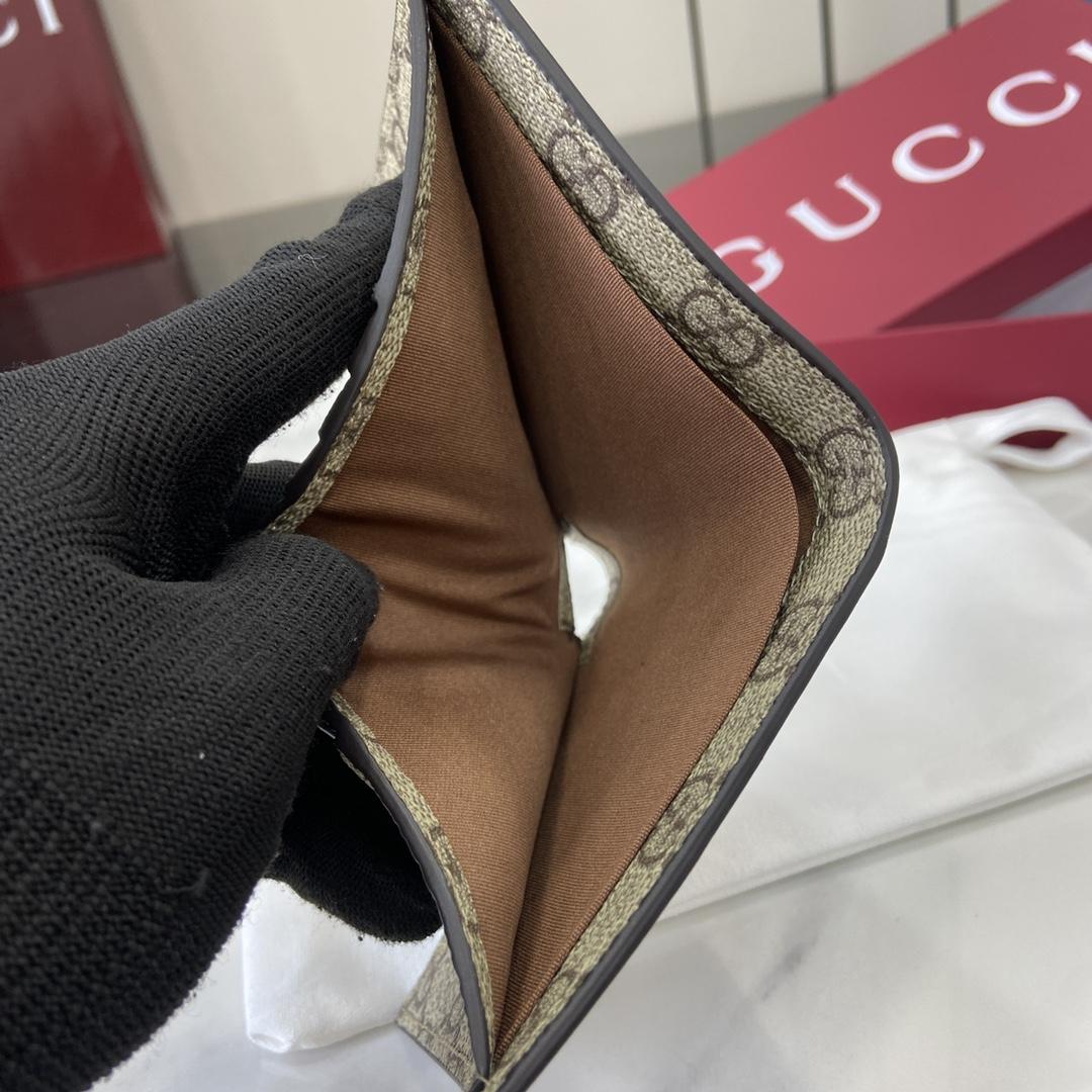 Gucci GG Emblem Bi-fold Embossed Wallet  - FashionPlug