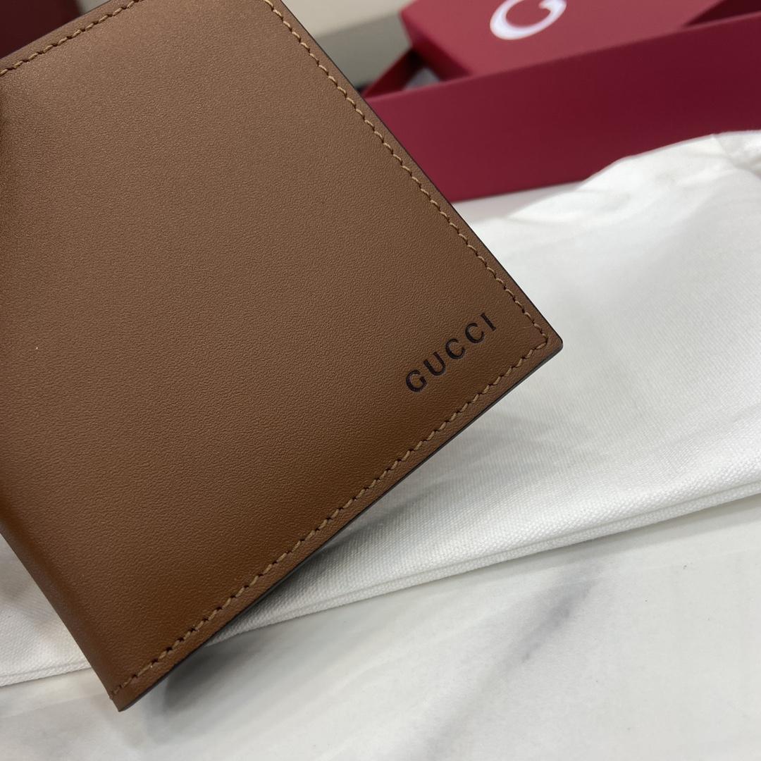 Gucci GG Emblem Bi-fold Embossed Wallet  - FashionPlug