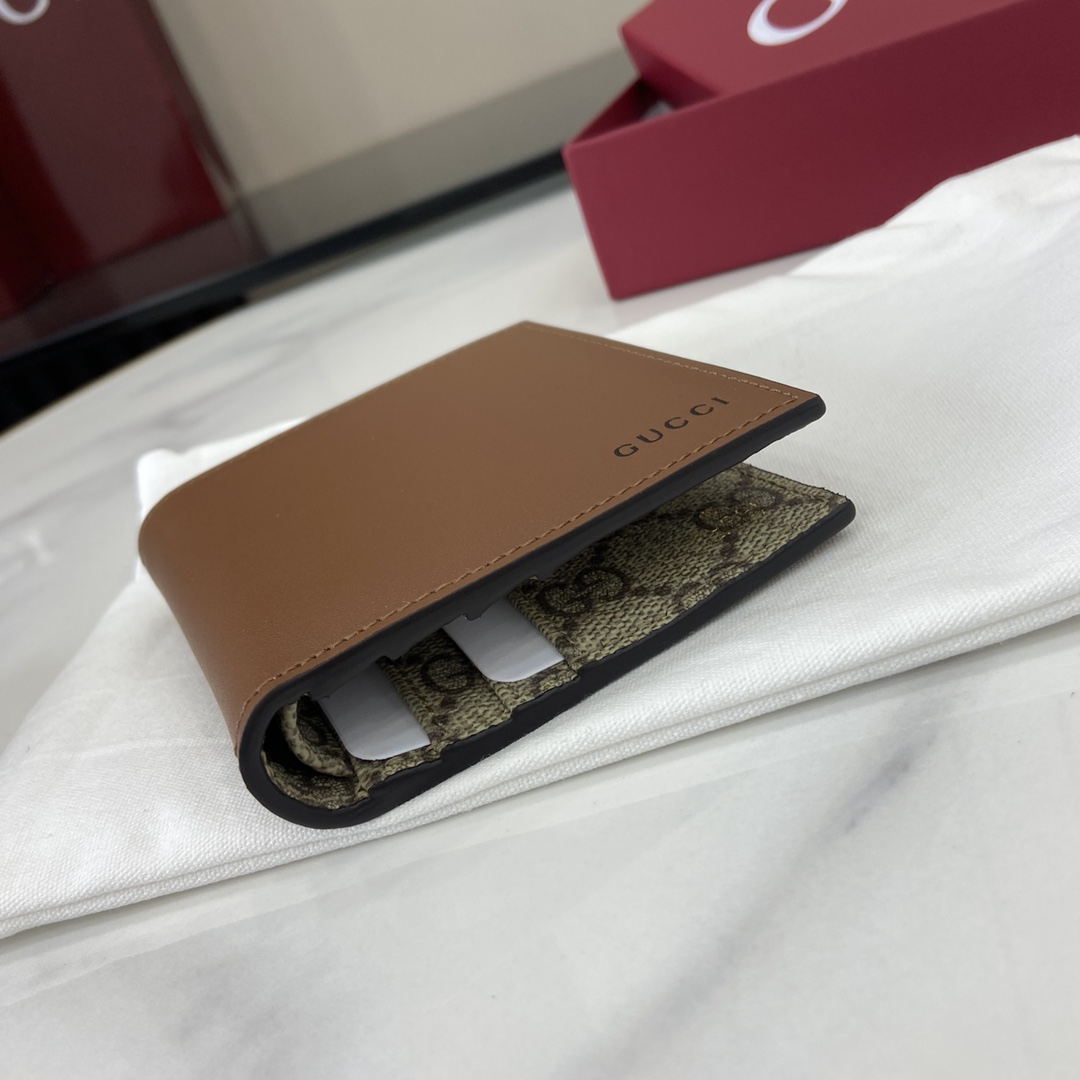 Gucci GG Emblem Bi-fold Embossed Wallet  - FashionPlug