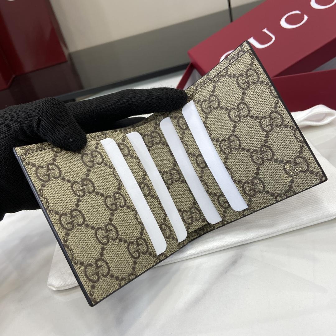 Gucci GG Emblem Bi-fold Embossed Wallet  - FashionPlug