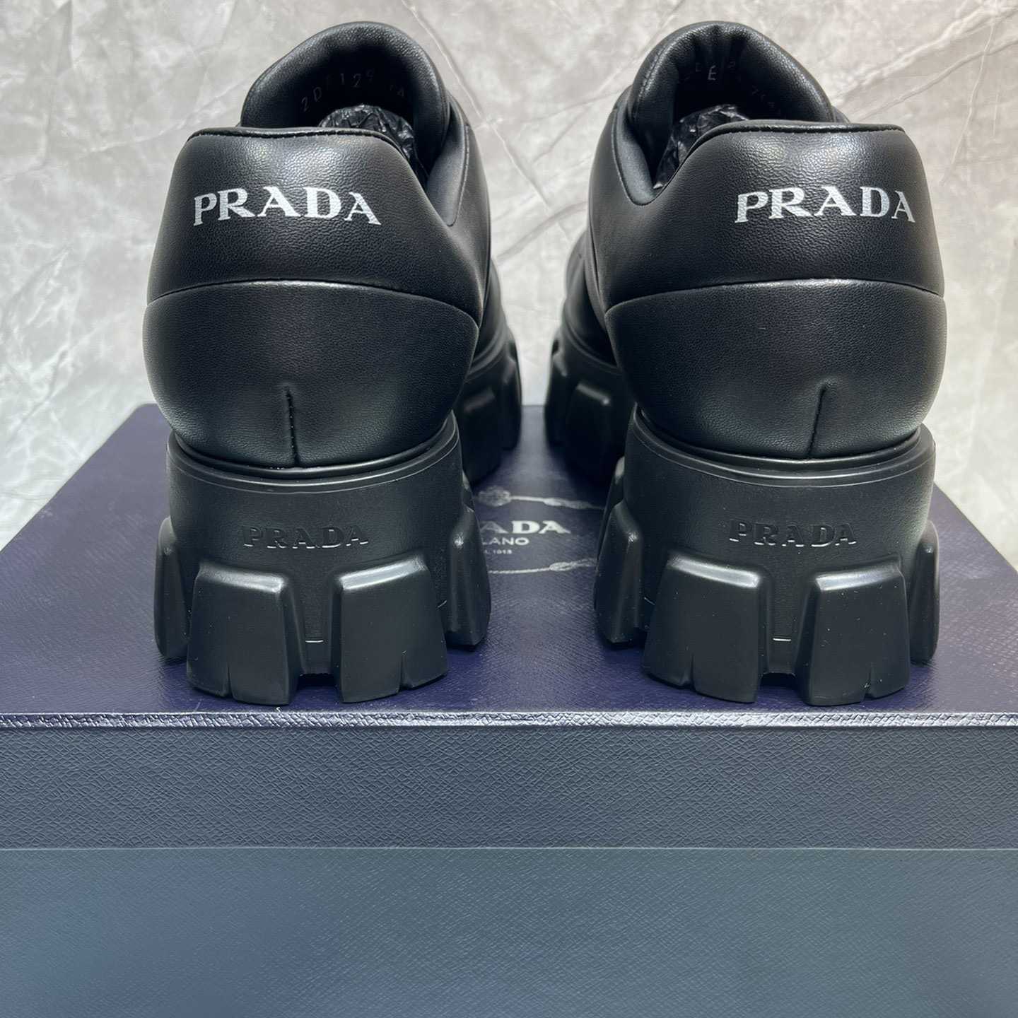 Prada Padded Nappa Leather Lace-up Shoes - FashionPlug