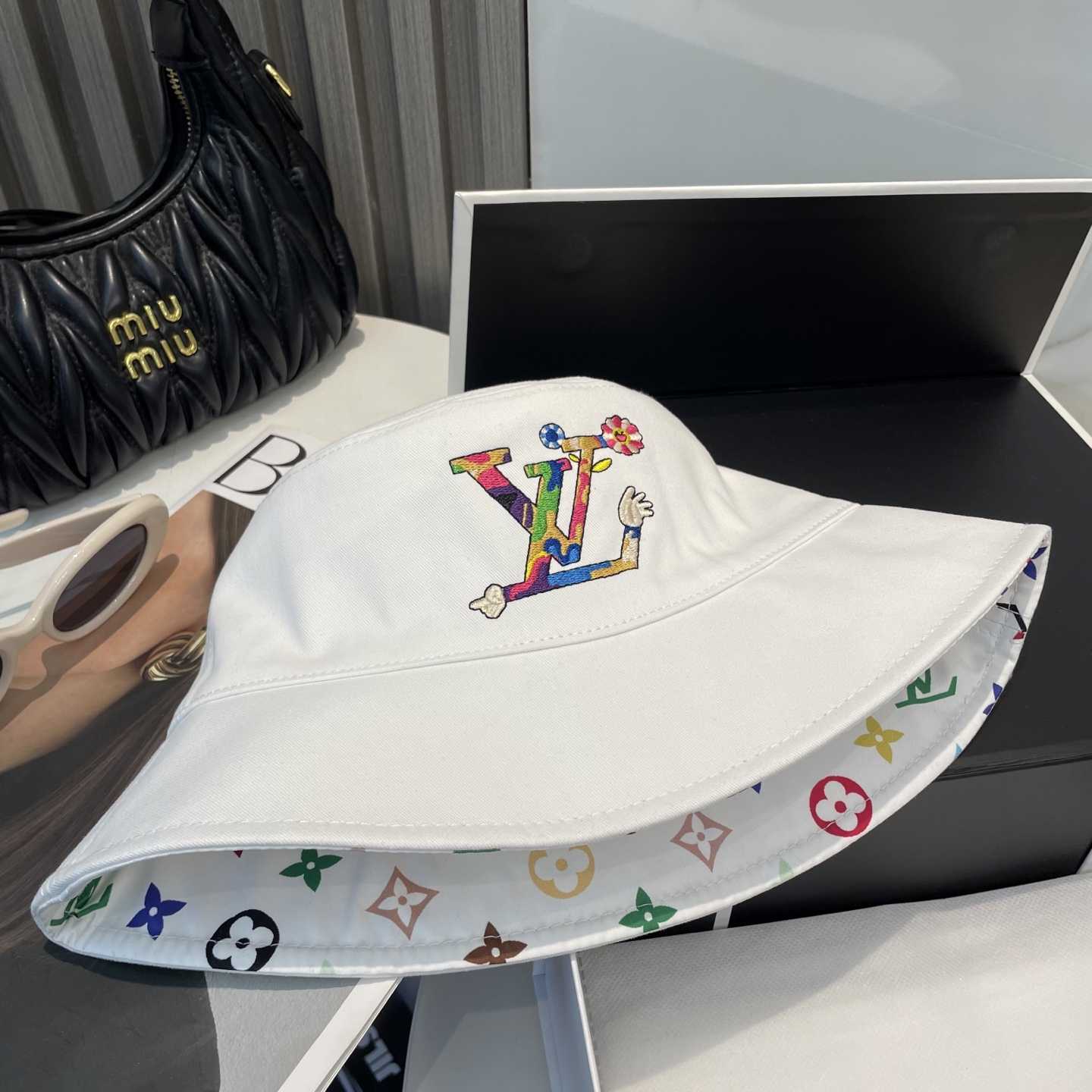 Louis Vuitton LV x TM Reversible Superflat Bucket Hat    - FashionPlug