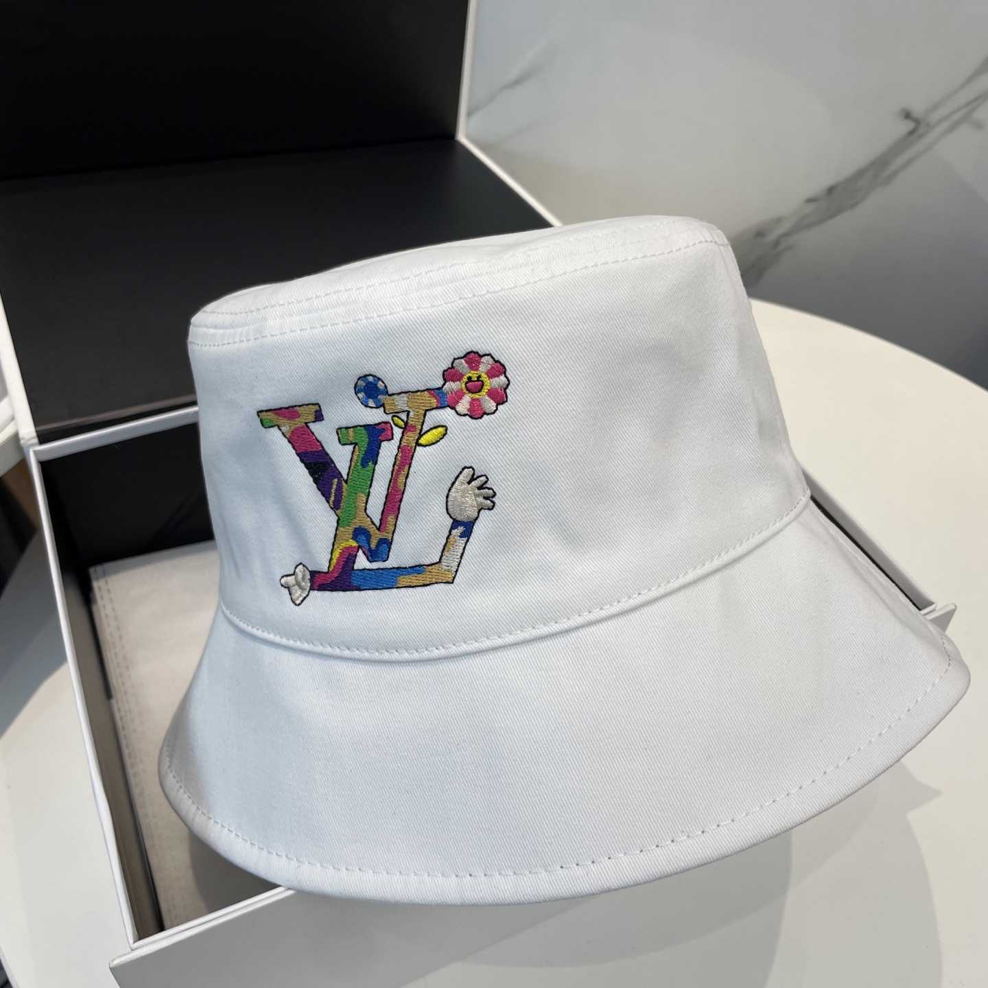 Louis Vuitton LV x TM Reversible Superflat Bucket Hat    - FashionPlug