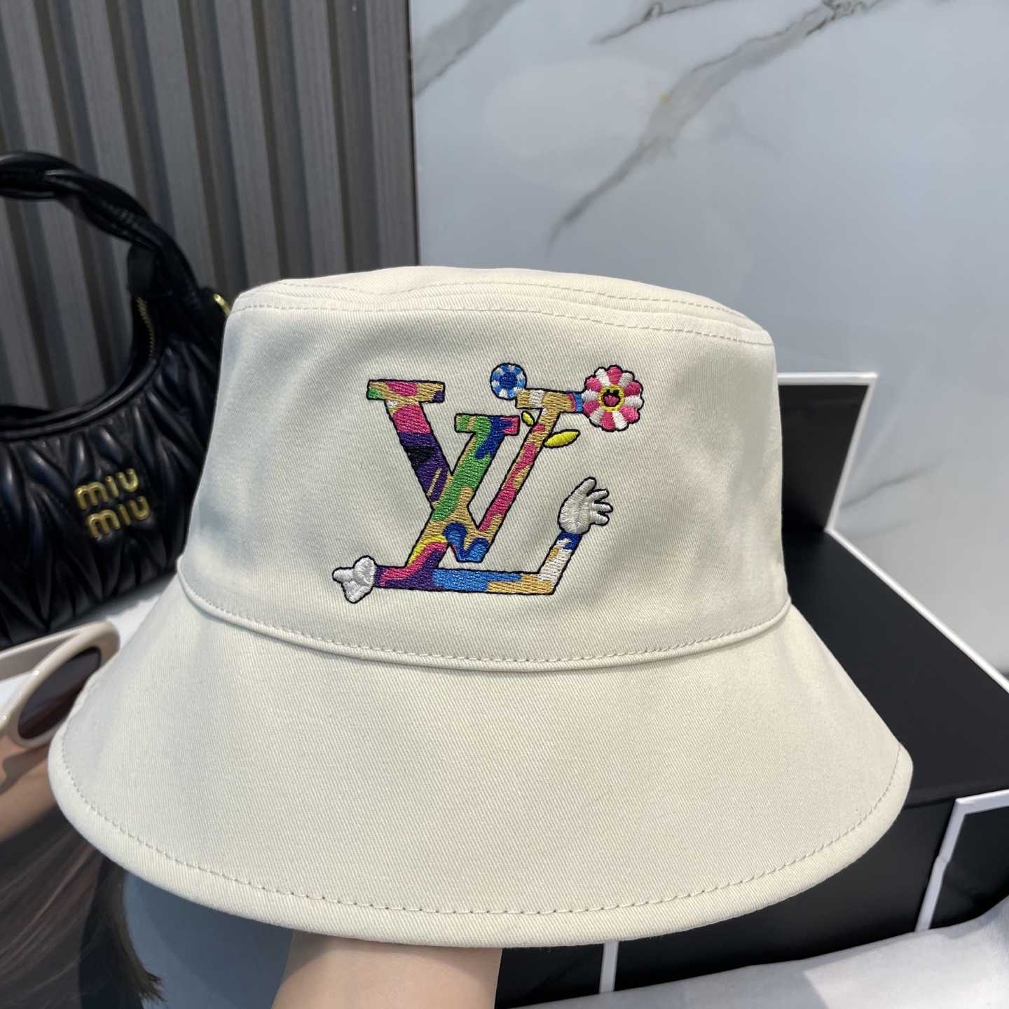 Louis Vuitton LV x TM Reversible Superflat Bucket Hat    - FashionPlug