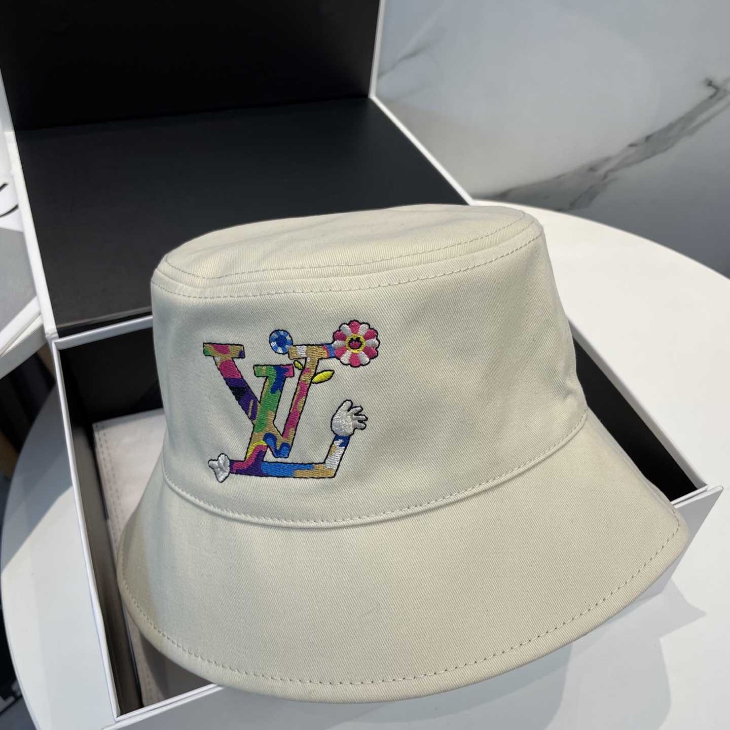 Louis Vuitton LV x TM Reversible Superflat Bucket Hat    - FashionPlug