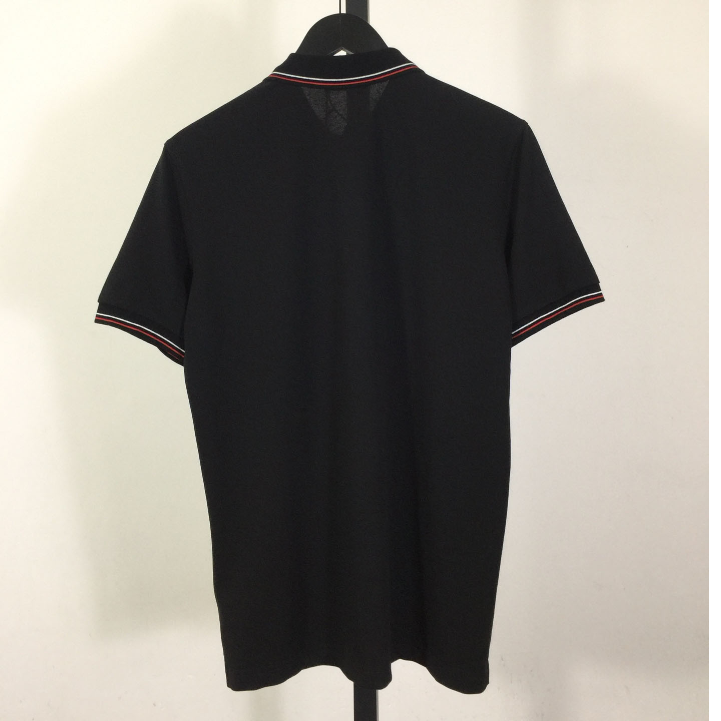 Prada Short-sleeved Piqué Polo Shirt - FashionPlug