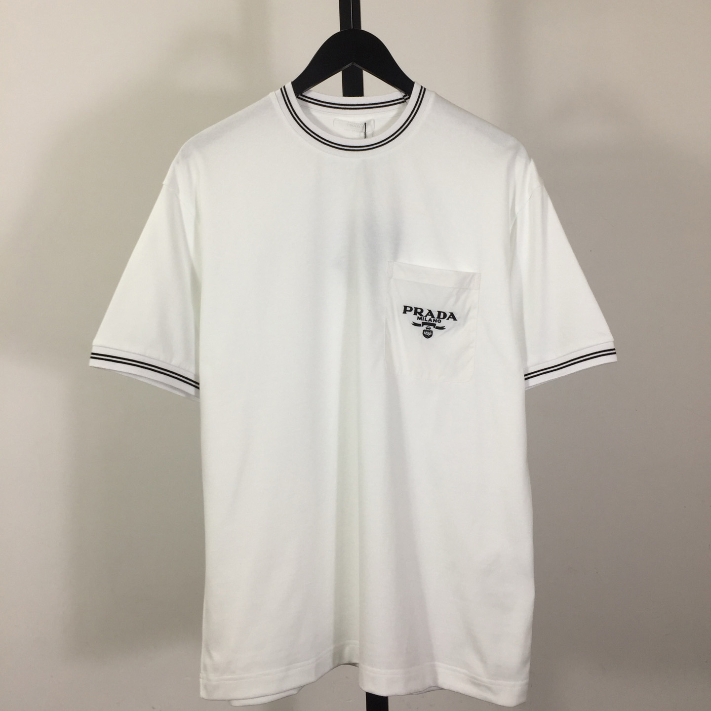 Prada T-shirt With Nylon Pocket And Letter Print - FashionPlug