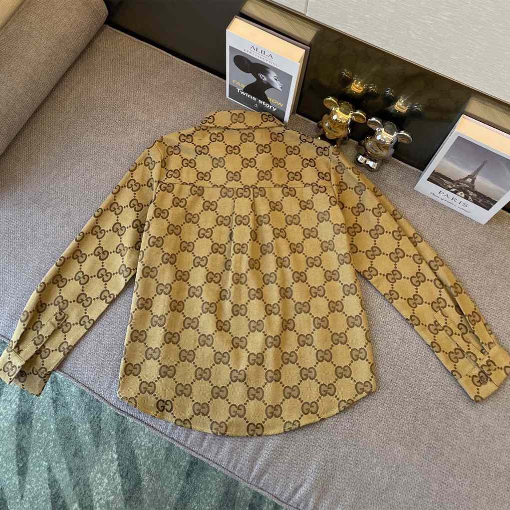 Gucci Maxi GG canvas shirt - FashionPlug