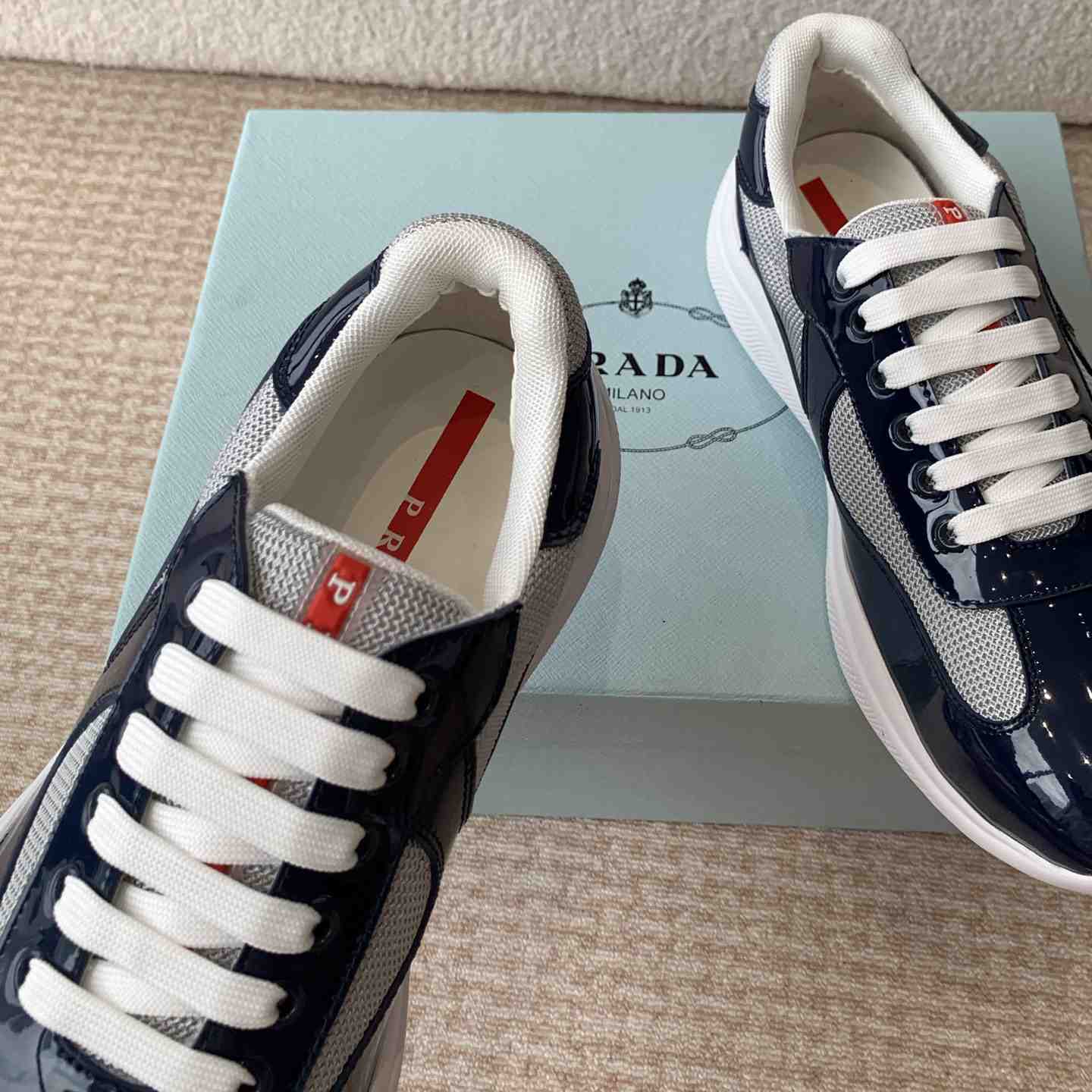 Prada Prada Cloudburst Gray Bronze Low Top Sneaker - FashionPlug