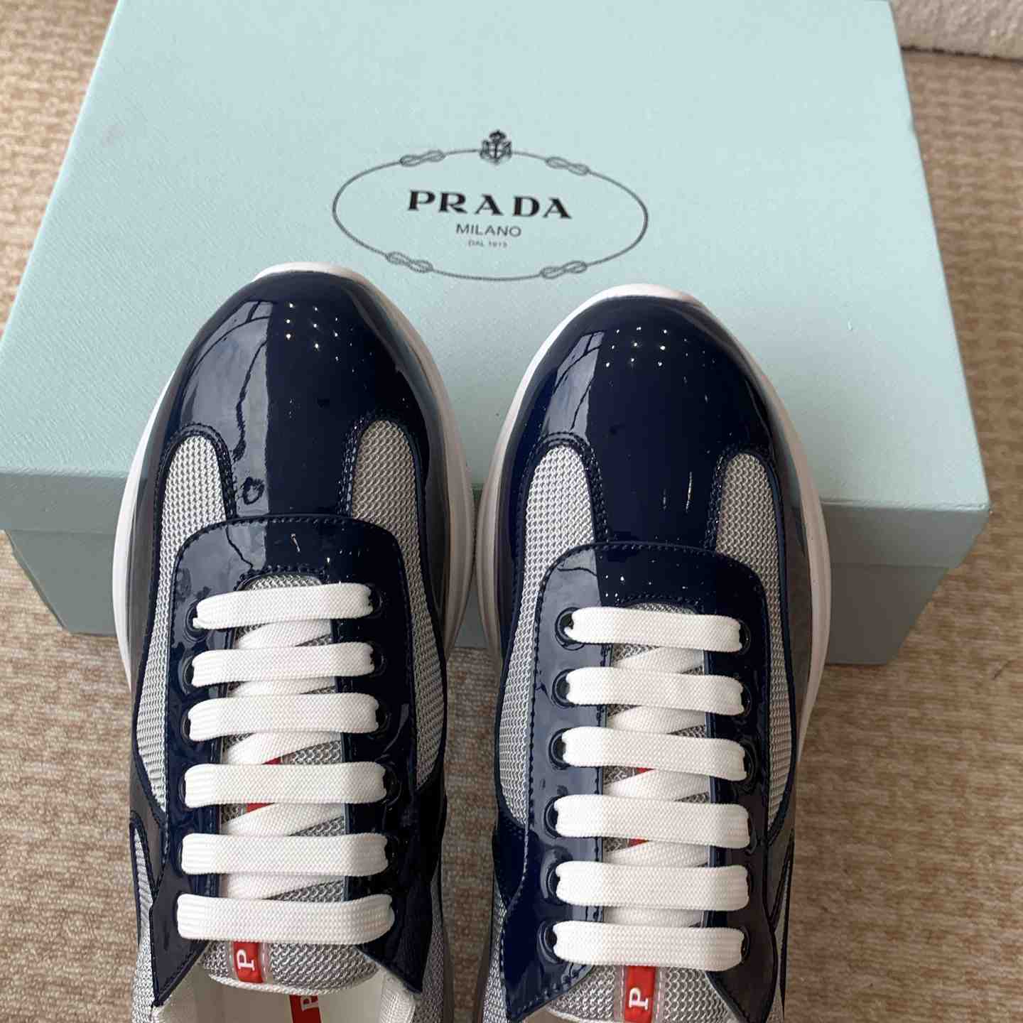 Prada Prada Cloudburst Gray Bronze Low Top Sneaker - FashionPlug